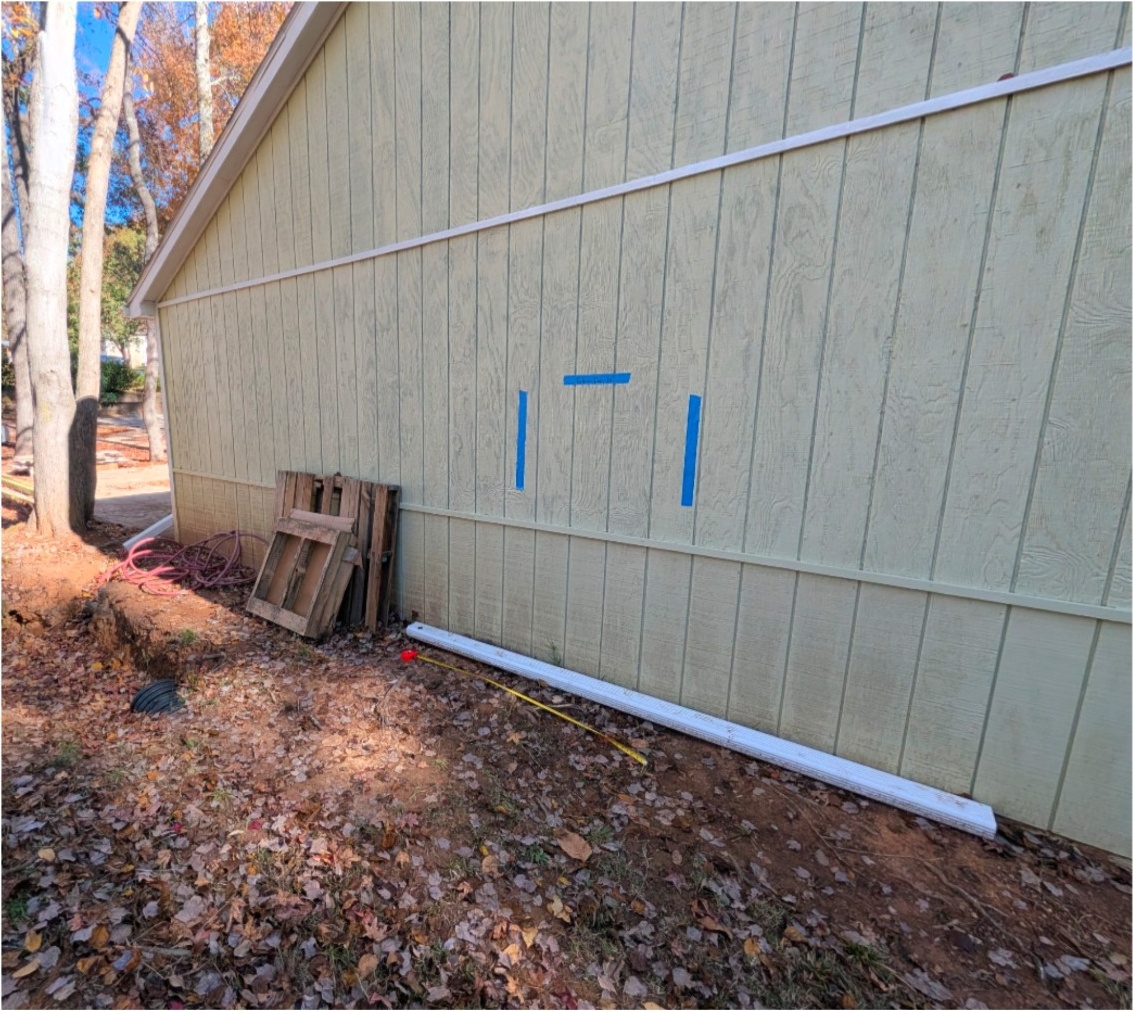 Before side exterior wall marked for new opening